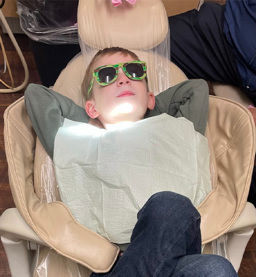 Young girl smiling after children's dentistry