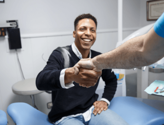 Man shaking hands with dentist