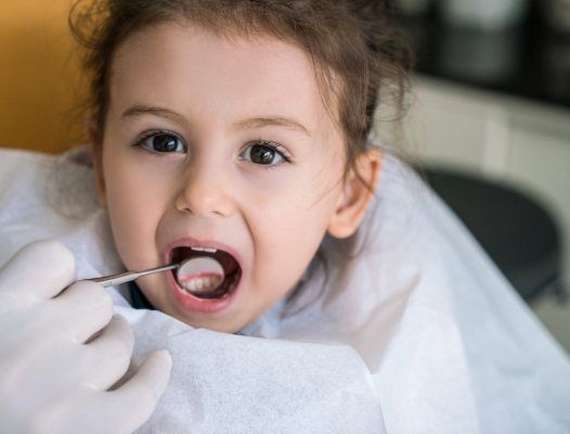Young girl receiving children's dental care