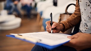 a patient filling out forms