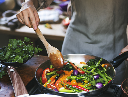 Person cooking a healthy meal