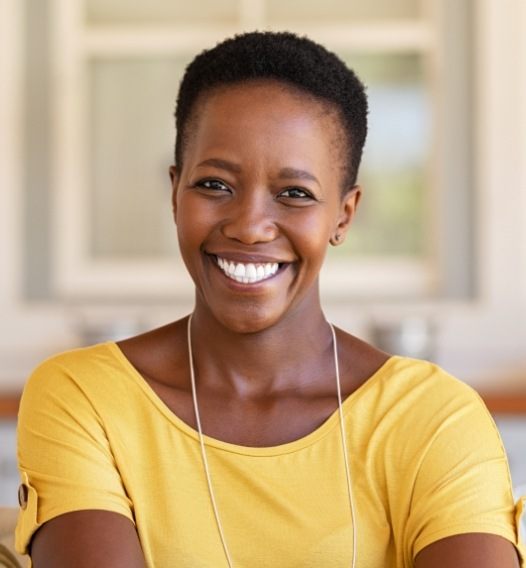 Woman sharing healthy smile after fluoride treatments