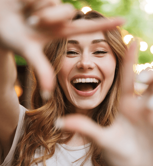 Woman showing off smile after gum recontouring