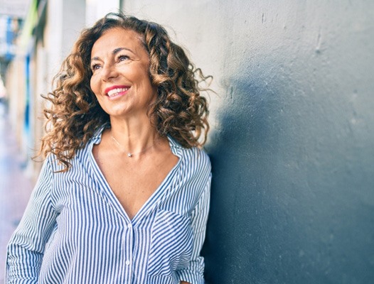 Woman with dental implants in DuPont    