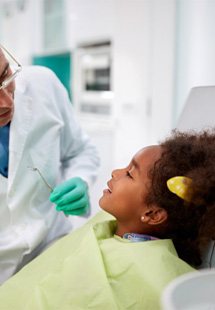 young girl visiting dentist 