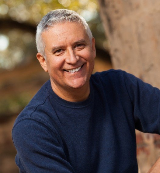 Man sharing smile after treatment using a nightguard for bruxism