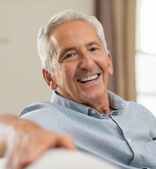 Man smiling after oral cancer screening