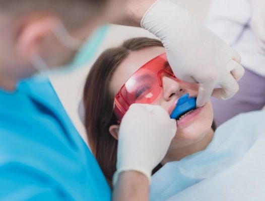 Patient receiving fluoride treatment