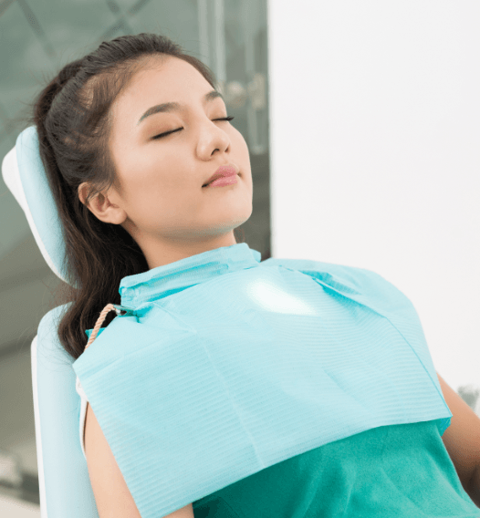 Patient relaxing during sedation dentistry visit