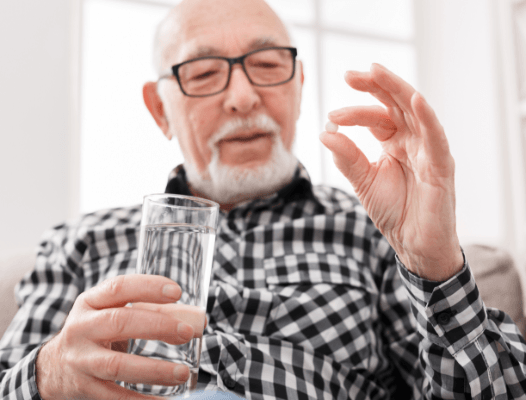 Man taking oral conscious dental sedation pill