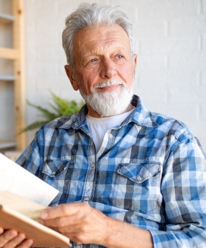 Man with healthy smile after restorative dentistry