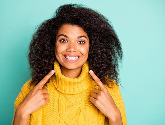 Woman after teeth whitening in DuPont