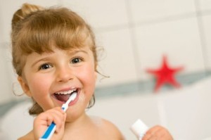 girl brushing teeth